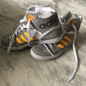 Adidas high top sneaks.